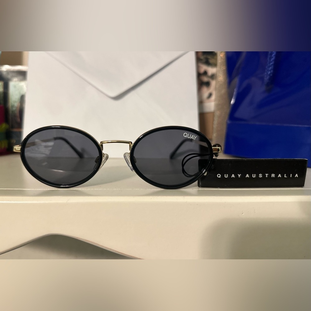Quay black oval sunglasses